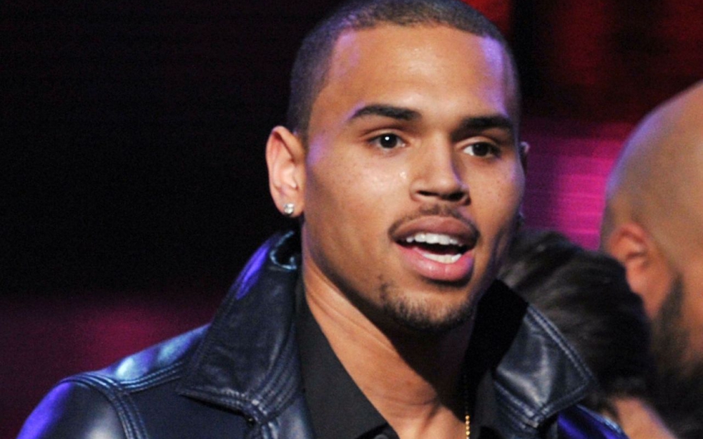 Photo de Chris Brown en garde à vue à paris pour viol