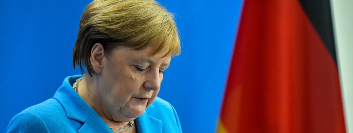 Photo de Angela Merkel explique -sans forcément convaincre- son état de santé
